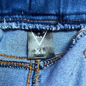 light blue and dark blue jean skirt fits as size